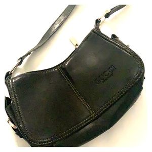 It’s a cute black handbag for a formal event
